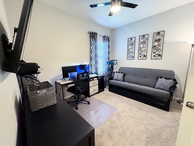 office area with carpet and ceiling fan