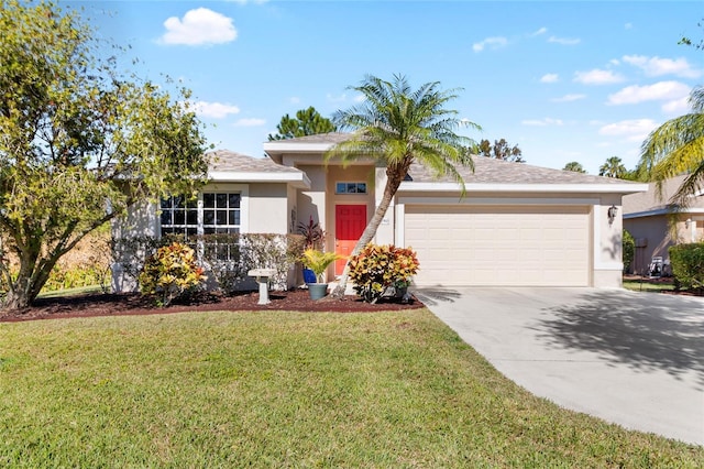 view of front of home with a garage and a front yard