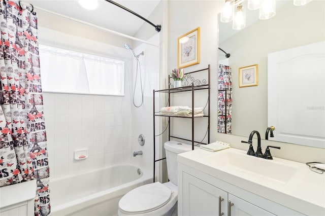 full bathroom with shower / bath combination with curtain, vanity, and toilet