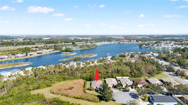 birds eye view of property featuring a water view