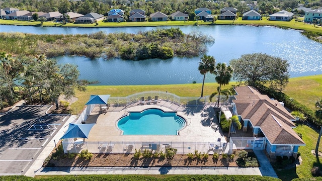 drone / aerial view featuring a water view