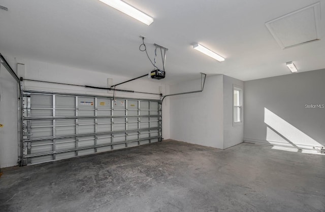 garage featuring a garage door opener