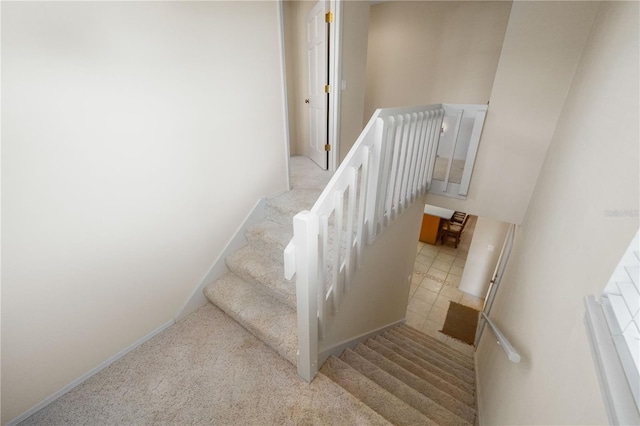 3401 Avenida Madera Unit B, Bradenton, FL 34210 - staircase featuring carpet floors
