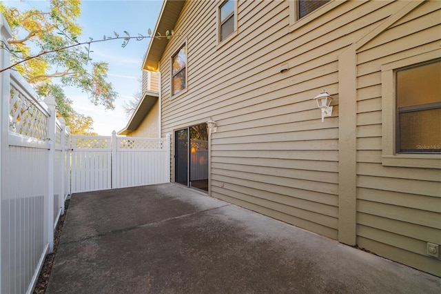 view of side of home featuring a patio