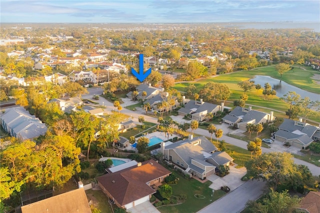 bird's eye view with a water view