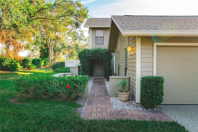 3401 Avenida Madera Unit B, Bradenton, FL 34210 - view of front of house with a shingled roof and an attached garage