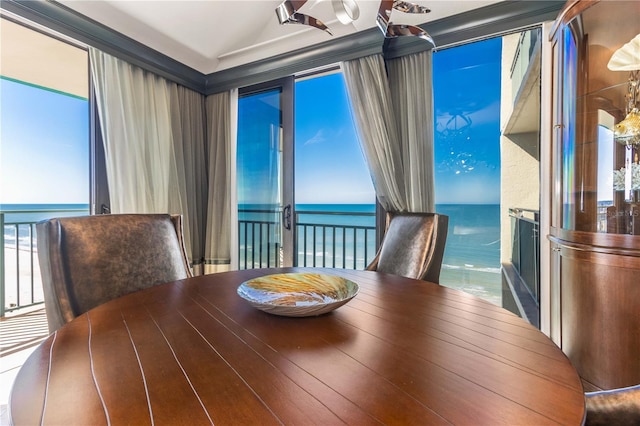 dining room featuring a water view