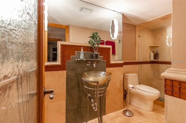 bathroom featuring toilet