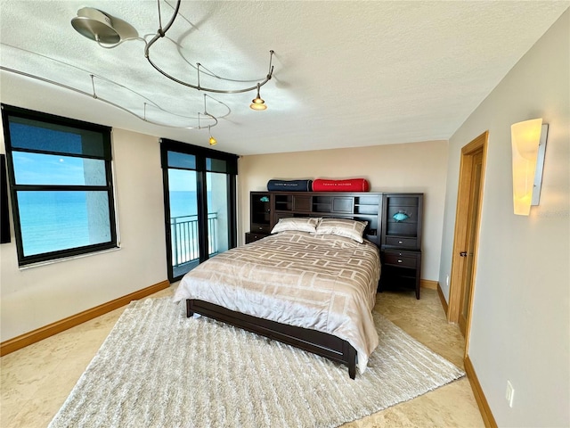 bedroom with a textured ceiling