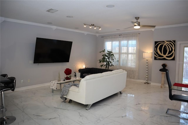 living room with ceiling fan and crown molding