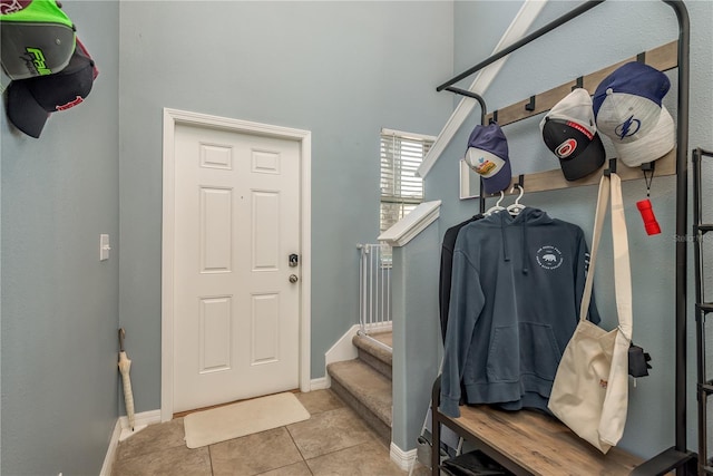 mudroom with light tile patterned floors