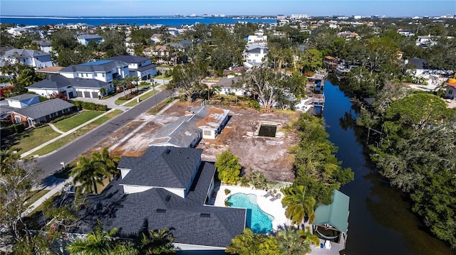 drone / aerial view with a water view