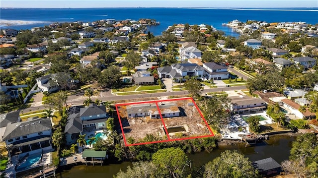 aerial view with a water view and a residential view