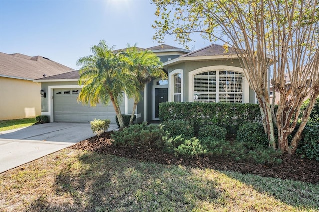 ranch-style home with a garage