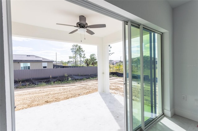 entryway featuring ceiling fan