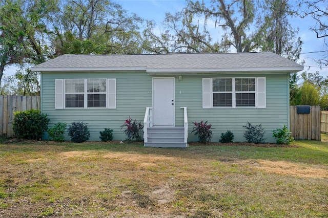 view of front of home with a front yard