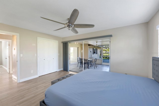 bedroom with ceiling fan and light hardwood / wood-style floors