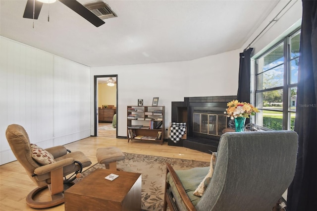 living room with a healthy amount of sunlight and light wood-type flooring