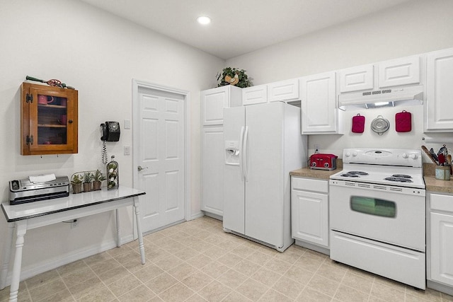 kitchen with white cabinets and white appliances