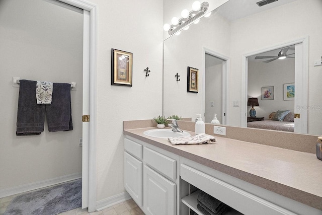 bathroom featuring vanity, tile patterned floors, and ceiling fan