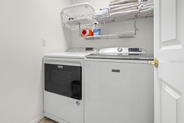 laundry room featuring independent washer and dryer