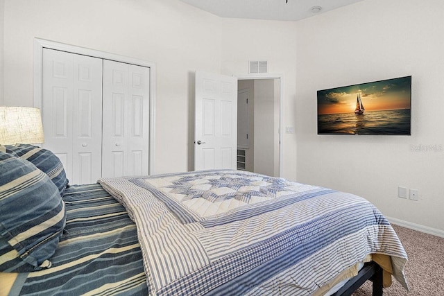 bedroom featuring carpet and a closet