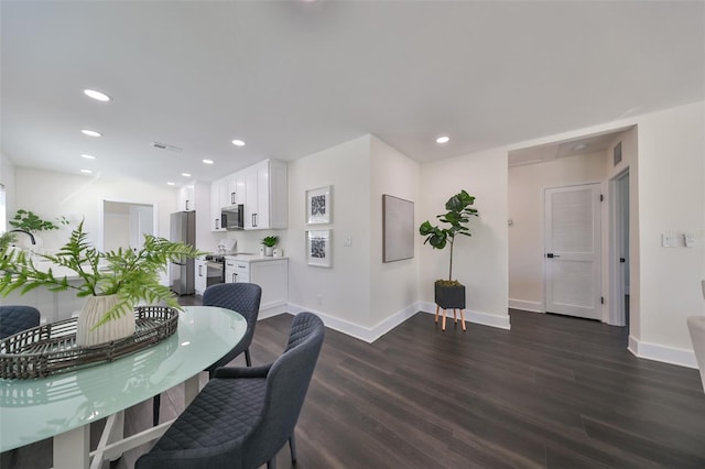 dining room featuring dark wood-type flooring