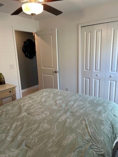 bedroom featuring ceiling fan