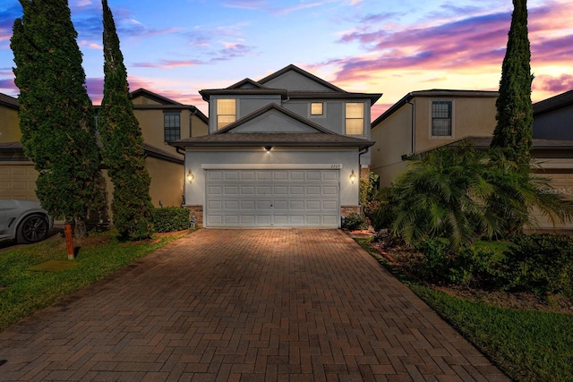 front of property featuring a garage