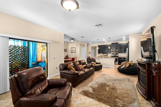 living room featuring light tile patterned flooring