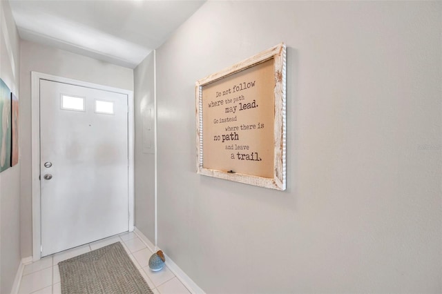 460 Paula Dr S Unit 101, Dunedin, FL 34698 - entrance foyer featuring baseboards and light tile patterned flooring