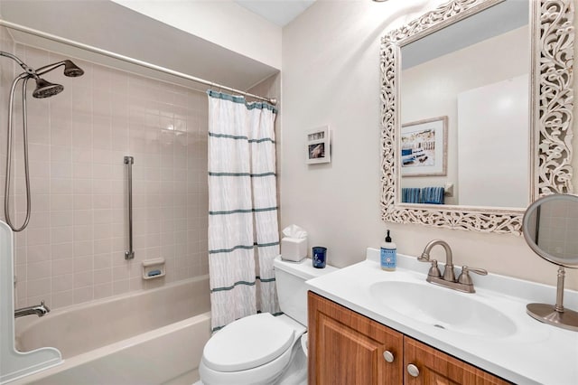 full bathroom with vanity, shower / tub combo, and toilet