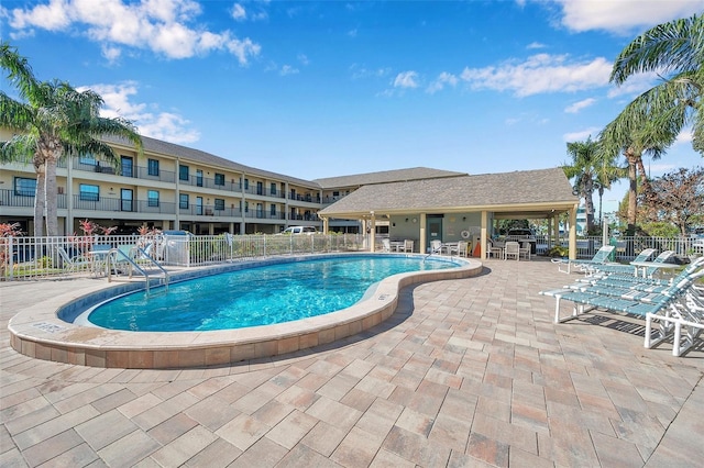 view of pool featuring a patio area