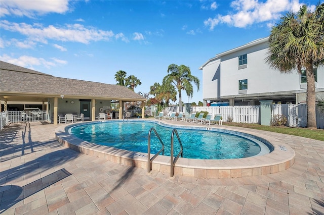 460 Paula Dr S Unit 101, Dunedin, FL 34698 - community pool featuring a patio