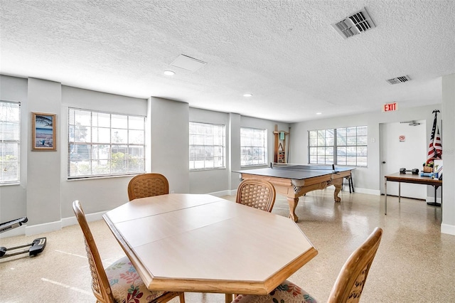 460 Paula Dr S Unit 101, Dunedin, FL 34698 - rec room featuring baseboards, a textured ceiling, and recessed lighting