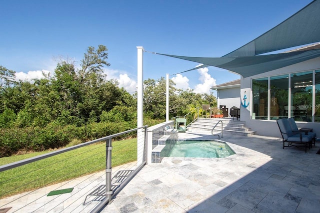 view of pool with a yard and a patio area