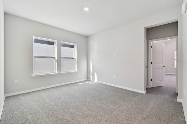 view of carpeted spare room