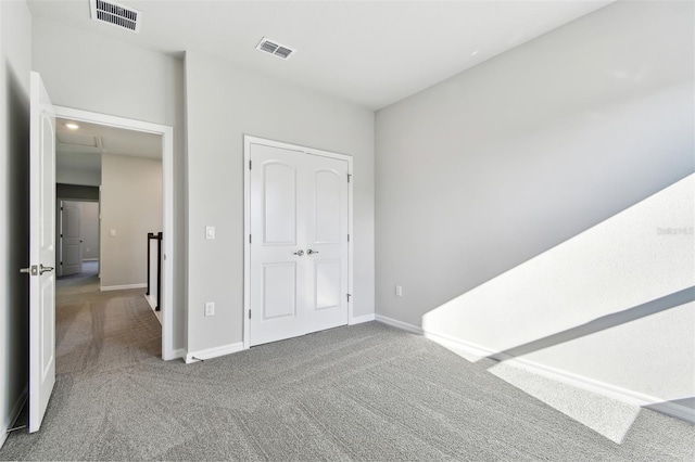 unfurnished bedroom featuring carpet floors