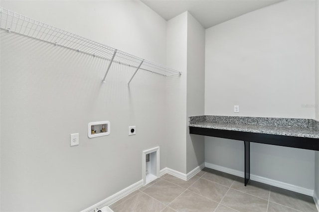 laundry room with washer hookup, light tile patterned floors, and electric dryer hookup