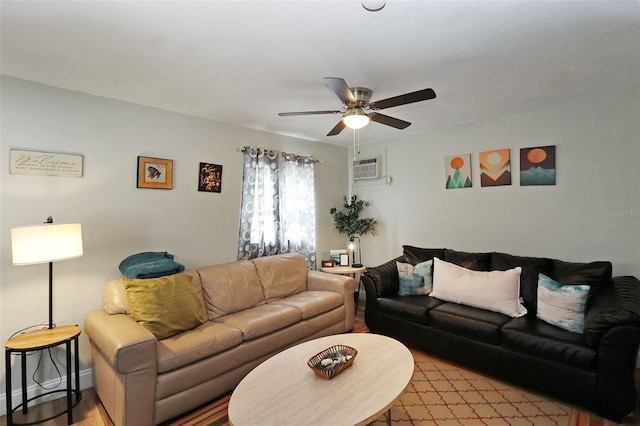 living room with ceiling fan and a wall mounted AC