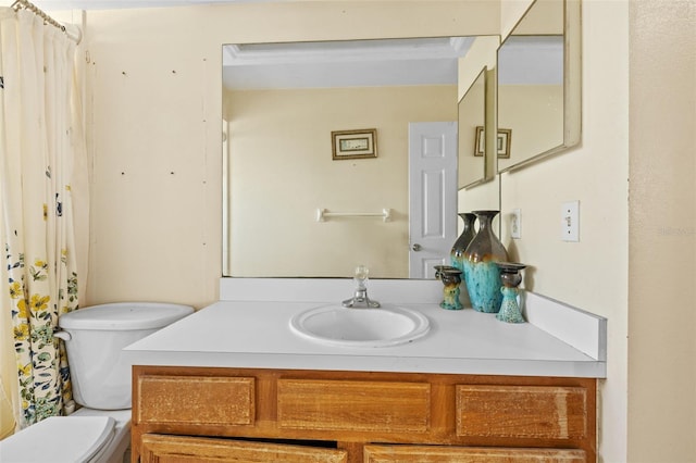 bathroom with vanity and toilet