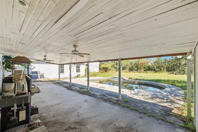 view of patio / terrace featuring area for grilling and ceiling fan