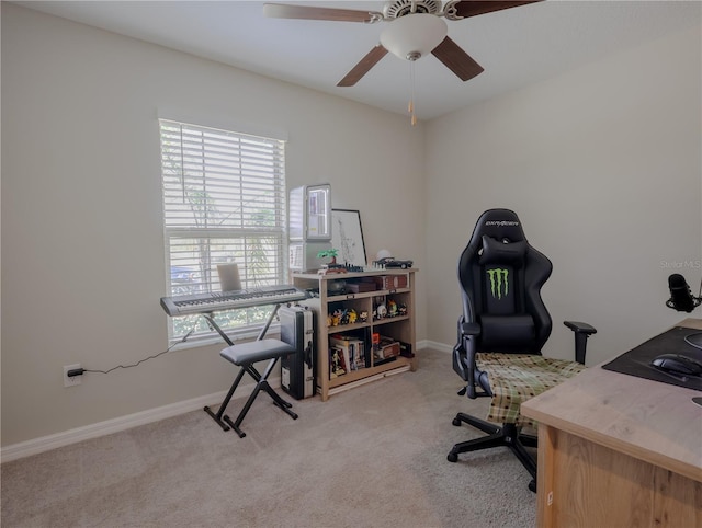 office featuring ceiling fan and light colored carpet