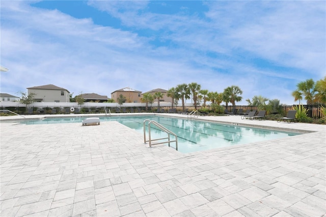 view of swimming pool featuring a patio