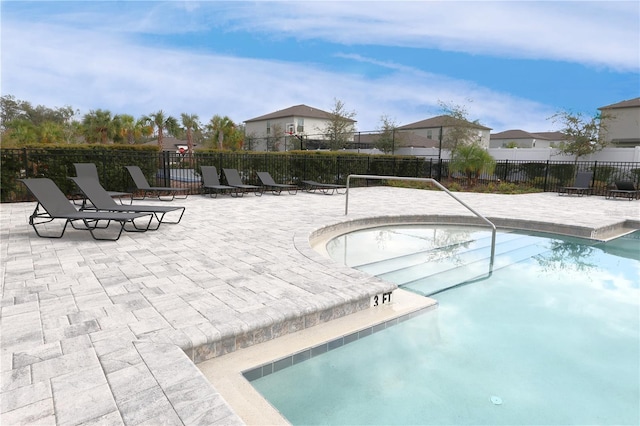 view of pool with a patio area