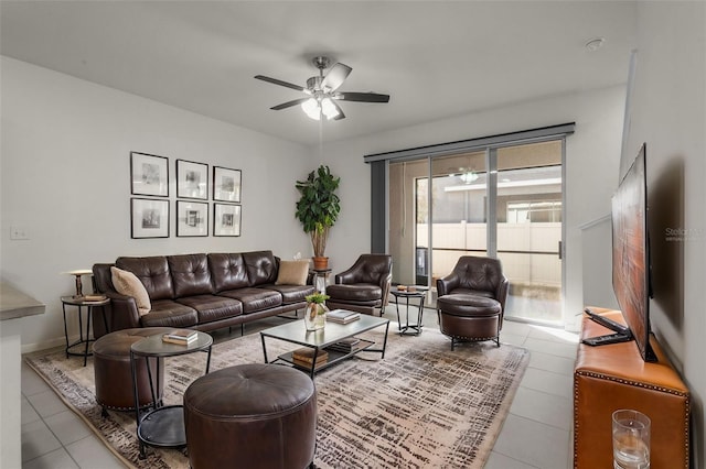 tiled living room with ceiling fan