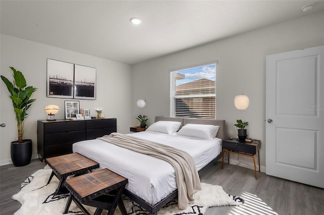 bedroom featuring hardwood / wood-style flooring