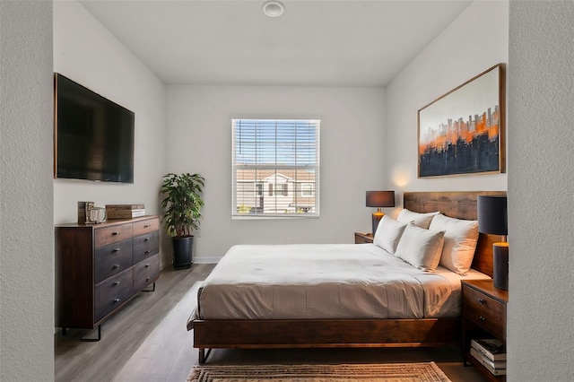 bedroom featuring light hardwood / wood-style floors