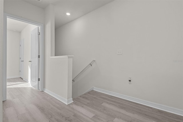 hallway with light wood-type flooring