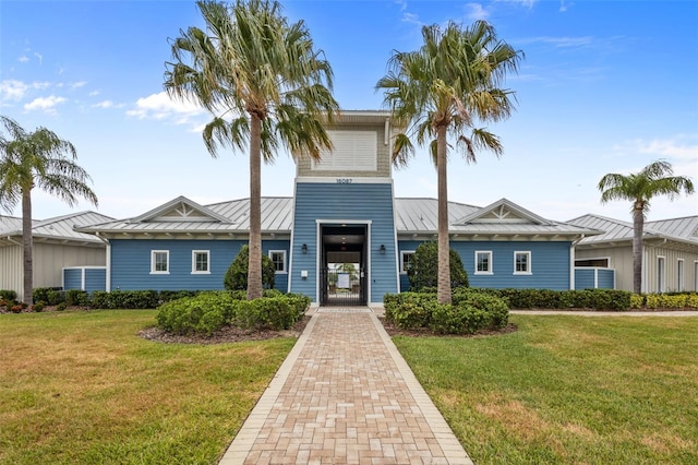 view of front of home with a front lawn